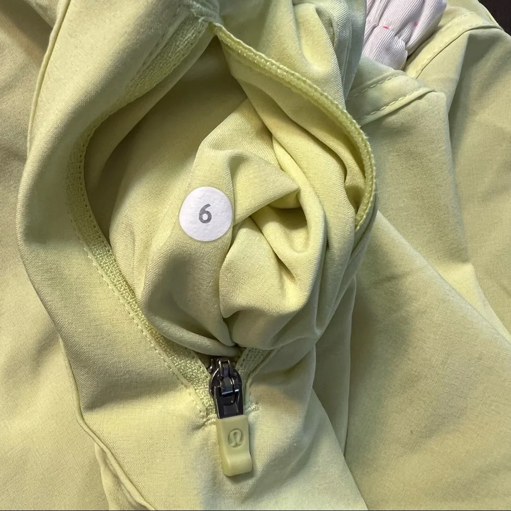 Lululemon Tracker Yellow Shorts with Multicolored Dot patterned waistband
